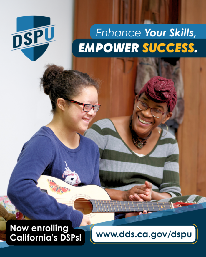 A direct support professional encourages a young person with a developmental disability playing guitar.